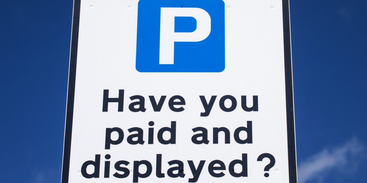 Parking charges sign