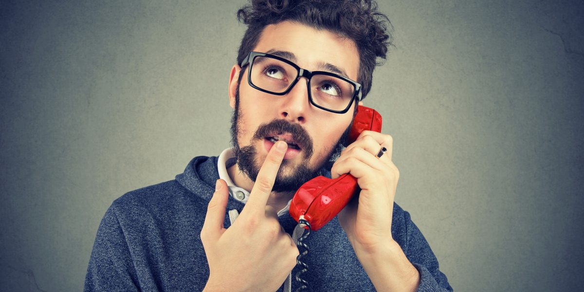 Man trying to give over the phone estimate