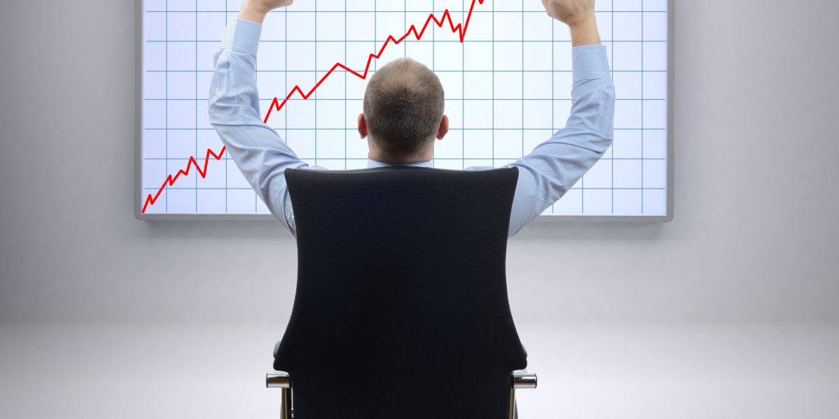Business growth chart in front of businessman