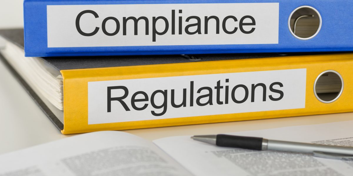 Folders showing compliance and regulations